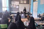 برگزاری کلاس آموزشی بیماریهای مشترک انسان ودام دردبیرستان عفاف شهرک هزارانی شهرستان آبدانان