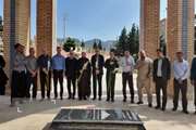 غبارروبی مزار شهید گمنام توسط کارکنان دامپزشکی استان ایلام