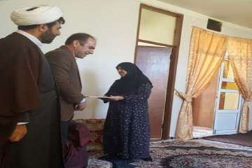 بازديد مديركل دامپزشكي استان ايلام به همراه جمعي از كاركنان اين اداره كل با خانواده هاي شهيد فتحي و 